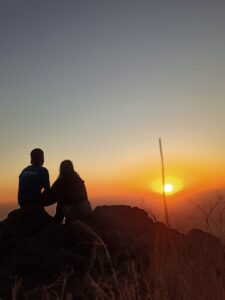 Couple watching sunset from kasauli mountain