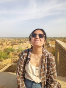 Girl smiling pose in Kuldhara village, Jaisalmer